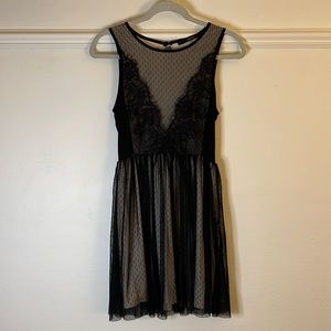 Black high neck, open back cocktail dress. size small. Like new worn once.